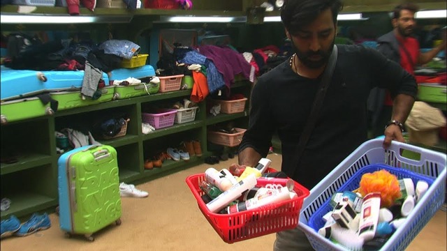 Manveer inspects Swamiji’s bags. (Colors) Manveer inspects Swamiji’s bags. (Colors)