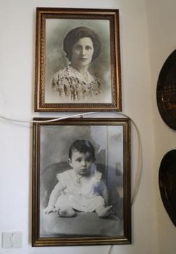 Black and white photos showing Emma Morano when she was 18 months and when she was 43-year old, are seen in her home during the day of her birthday in Verbania, Italy. (AP) Black and white photos showing Emma Morano when she was 18 months and when she was 43-year old, are seen in her home during the day of her birthday in Verbania, Italy. (AP)