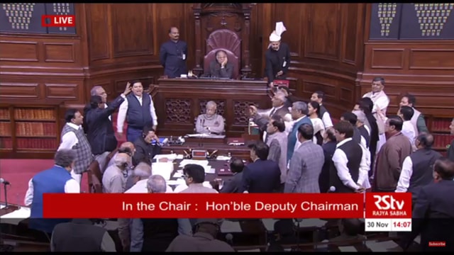 Lawmakers give ‘Jai jawan, Jai Kisan’ slogans in the Well before deputy chairman. (Rajya Sabha TV) Lawmakers give ‘Jai jawan, Jai Kisan’ slogans in the Well before deputy chairman. (Rajya Sabha TV)