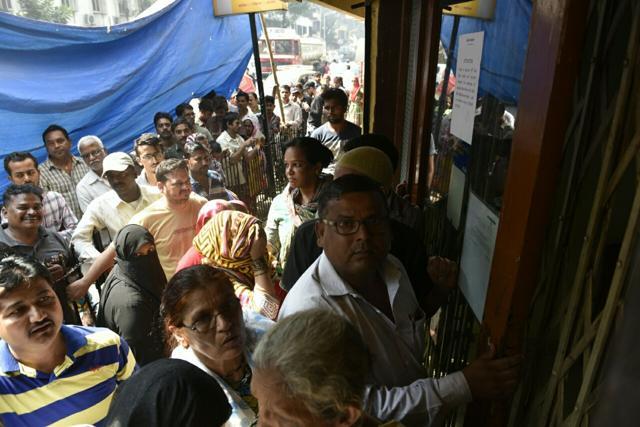 Large crowds form outside an ATM in Mahim on Wednesday. (Satish Bate) Large crowds form outside an ATM in Mahim on Wednesday. (Satish Bate)