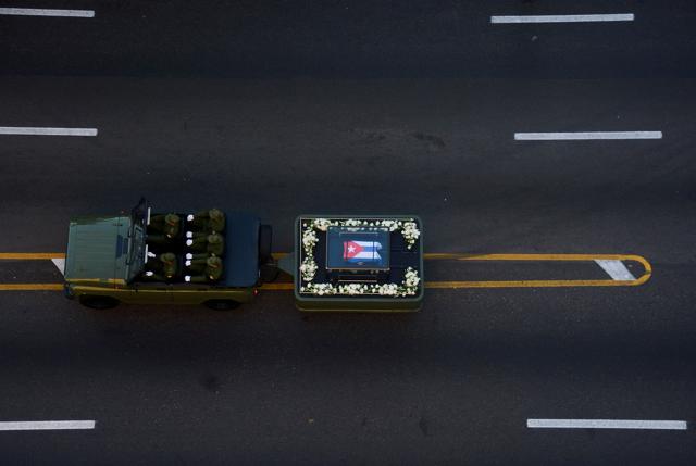 The urn with the ashes of Cuban leader Fidel Castro is driven through the streets of Havana.  (AFP)