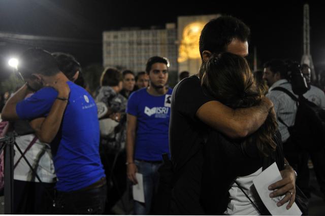 People mourn the late Cuban leader Fidel Castro during a massive rally.  (AFP)