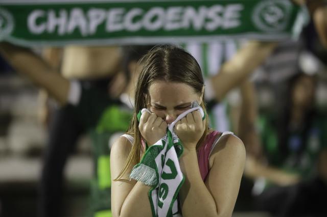Mourning fans was dressed in the club’s green and white jerseys. (AP) Mourning fans was dressed in the club’s green and white jerseys. (AP)