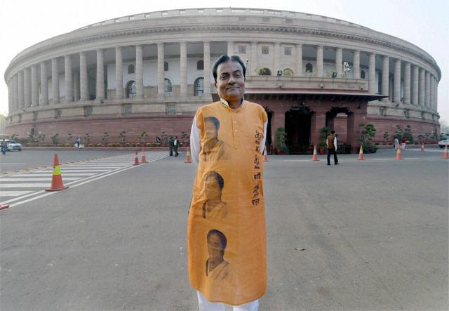 TMC MP Idris Ali wore a kurta with the photo of party chief Mamata Banerjee drawn on it, at Parliament House in New Delhi. (PTI Photo)