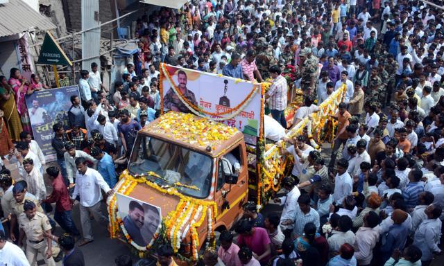 Major Kunal Gosavi’s body was kept in Pandharpur town for a few hours and was later taken to Vakhari village. The funeral procession took more than four hours to traverse 4km. (HT photo) Major Kunal Gosavi’s body was kept in Pandharpur town for a few hours and was later taken to Vakhari village. The funeral procession took more than four hours to traverse 4km. (HT photo)