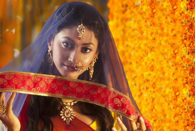 Dupatta on the head: A bride knows it all. (Shutterstock) Dupatta on the head: A bride knows it all. (Shutterstock)