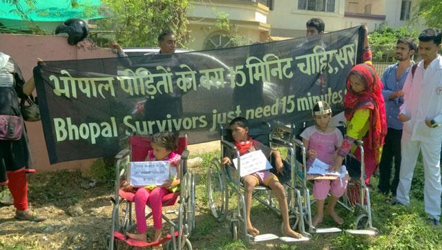 Differently abled children from gas tragedy affected families wait with banners seeking PM's attention during his visit to Bhopal on Thursday. (HT file photo) Differently abled children from gas tragedy affected families wait with banners seeking PM's attention during his visit to Bhopal on Thursday. (HT file photo)