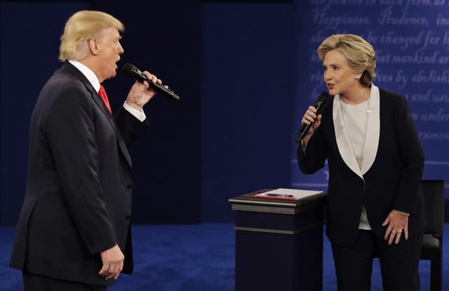 Republican presidential nominee Donald Trump and Democratic presidential nominee Hillary Clinton speak during the second presidential debate at Washington University in St. Louis. (AP File Photo) Republican presidential nominee Donald Trump and Democratic presidential nominee Hillary Clinton speak during the second presidential debate at Washington University in St. Louis. (AP File Photo)
