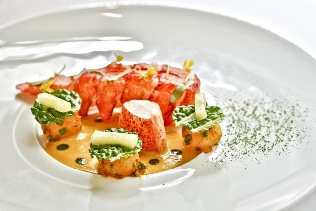 Maine Lobster with Madras potatoes, Savoy cabbage and coastal curry sauce (Susie Biehler Photography) Maine Lobster with Madras potatoes, Savoy cabbage and coastal curry sauce (Susie Biehler Photography)