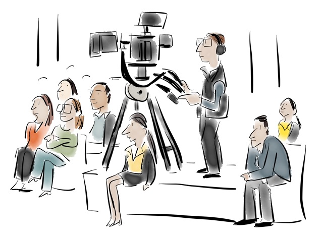 Watching and recording: A cameraman on the job at the HTLS as delegates attend a session. Watching and recording: A cameraman on the job at the HTLS as delegates attend a session.