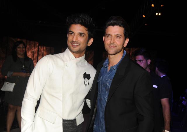 Sushant Singh Rajput and Hrithik Roshan attend the GQ Fashion Nights 2016 menswear fashion show in Mumbai on December 3, 2016. (AFP)