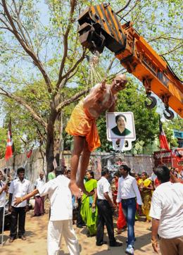 A man suspended himself from a crane using hooks pierced into his back on October 3, 2016 as a ritual for the well-being of Tamil Nadu chief minister J Jayalalithaa, who has in the hospital for more than two months. Jayalalithaa suffered a cardiac arrest on December 4, 2016, worsening fears over her failing health. (AFP) A man suspended himself from a crane using hooks pierced into his back on October 3, 2016 as a ritual for the well-being of Tamil Nadu chief minister J Jayalalithaa, who has in the hospital for more than two months. Jayalalithaa suffered a cardiac arrest on December 4, 2016, worsening fears over her failing health. (AFP)