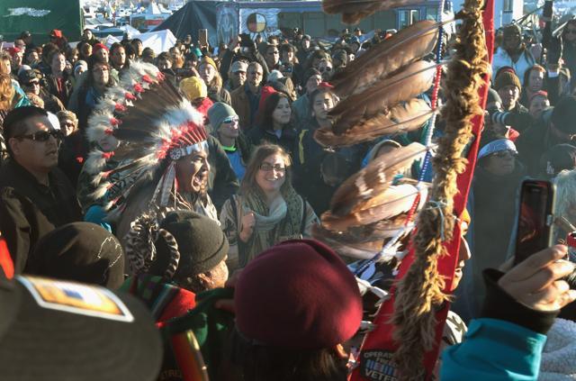 Native American and other activists celebrate after learning an easement had been denied for the Dakota Access Pipeline at Oceti Sakowin Camp on the edge of the Standing Rock Sioux Reservation on December 4, 2016 outside Cannon Ball, North Dakota. (AFP Photo) Native American and other activists celebrate after learning an easement had been denied for the Dakota Access Pipeline at Oceti Sakowin Camp on the edge of the Standing Rock Sioux Reservation on December 4, 2016 outside Cannon Ball, North Dakota. (AFP Photo)