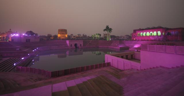 Surajkund Pond and an illuminated Satkhanda at the background. (HT Photo)
