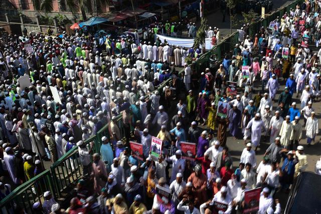 Bangladeshi activists from Islamic organisations march towards the Myanmar embassy in Dhaka on December 6, 2016, to protest against the persecution of Rohingya Muslims in Myanmar. Around 21,000 Rohingya have entered Bangladesh in recent weeks after fleeing violence in neighbouring Myanmar, an official from the International Organisation for Migration said December 6. (AFP) Bangladeshi activists from Islamic organisations march towards the Myanmar embassy in Dhaka on December 6, 2016, to protest against the persecution of Rohingya Muslims in Myanmar. Around 21,000 Rohingya have entered Bangladesh in recent weeks after fleeing violence in neighbouring Myanmar, an official from the International Organisation for Migration said December 6. (AFP)