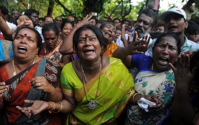 Jayalalithaa’s supporters wail outside the hospital where she was being treated after rumours of her death started circulating. (AFP) Jayalalithaa’s supporters wail outside the hospital where she was being treated after rumours of her death started circulating. (AFP)