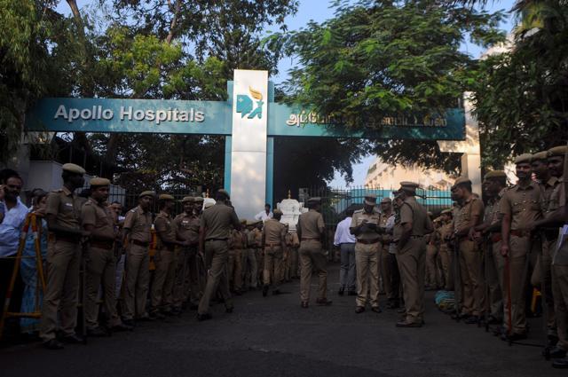 Police gather in front of Apollo hospital where Jayalalithaa Jayaram was being treated, in Chennai. (AFP File Photo) Police gather in front of Apollo hospital where Jayalalithaa Jayaram was being treated, in Chennai. (AFP File Photo)