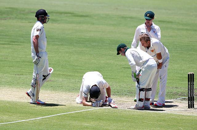 Adam Voges sinks to his knees after being struck in the head by a bouncer from Cameron Stevenson. (Getty Images) Adam Voges sinks to his knees after being struck in the head by a bouncer from Cameron Stevenson. (Getty Images)