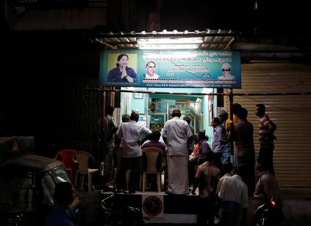 Supporters of late Tamil Nadu chief minister Jayalalithaa Jayaraman at the AIADMK party office in Mumbai. (Reuters File Photo)