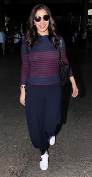 Sophie Choudry looks chic and comfy in her white sneakers. (Yogen Shan) Sophie Choudry looks chic and comfy in her white sneakers. (Yogen Shan)