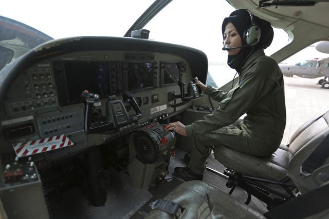 Capt Safia Ferozi, 26, sits in a C-208, a turboprop plane used as transport for the armed forces, before a flight, at the Afghan military airbase in Kabul, Afghanistan. (AP) Capt Safia Ferozi, 26, sits in a C-208, a turboprop plane used as transport for the armed forces, before a flight, at the Afghan military airbase in Kabul, Afghanistan. (AP)