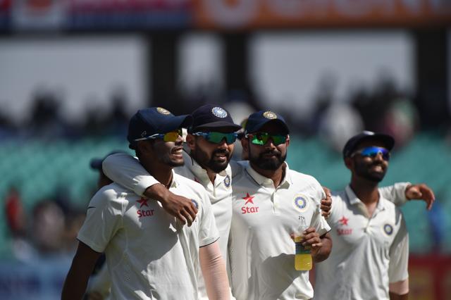 India's Umesh Yadav (from left), Murali Vijay and Mohammed Shami walk back to the pavilion during the first India vs England Test in Rajkot. (AFP)