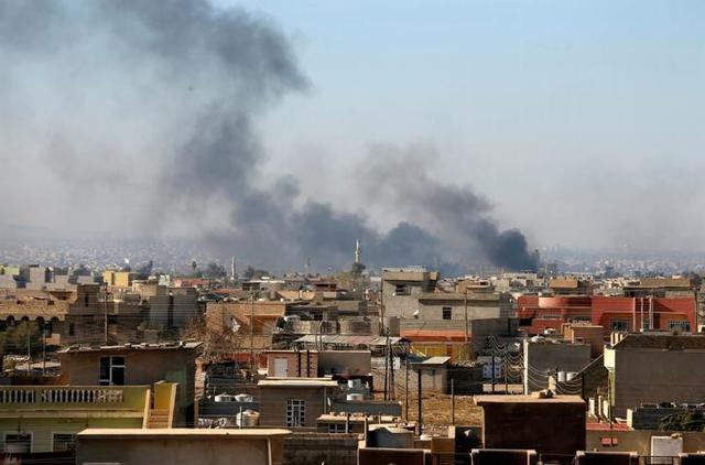 Smoke rises over Mosul during a battle with Islamic State militants. (Reuters Photo) Smoke rises over Mosul during a battle with Islamic State militants. (Reuters Photo)