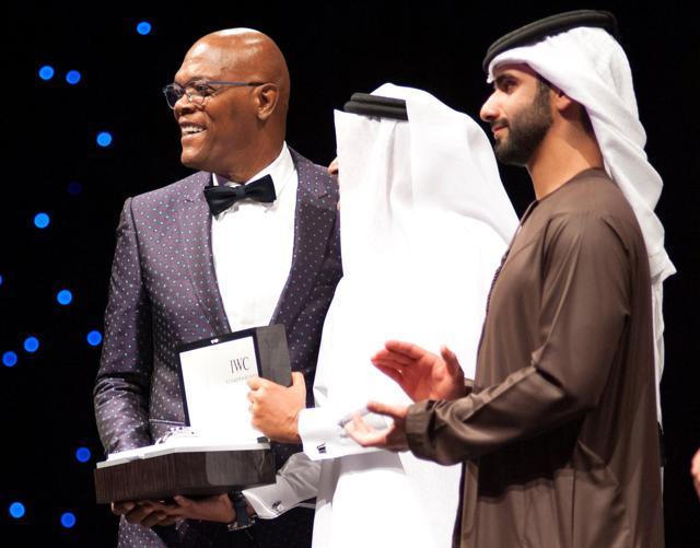 American actor Samuel Jackson receives an award at the Dubai International Film Festival in Dubai. (REUTERS)