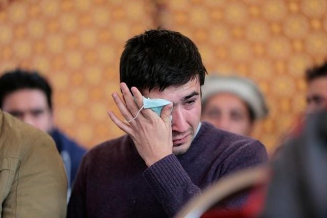 Relatives grieve as they wait for word on the collection of remains of victims of the Pakistan International Airlines (PIA) plane crash at PIMS Hospital in Islamabad on December 8, 2016. (Reuters)