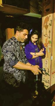 Aishwaryaa Rajinikanth checks out her picture on the camera of ace lensman Subi Samuel, while shooting in Chennai exclusively for