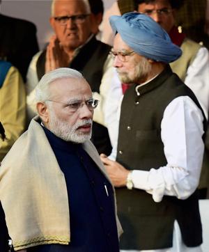 Prime Minister Narendra Modi (L) with former Prime Minister Manmohan Singh at Parliament House Lawns in New Delhi. (PTI file photo) Prime Minister Narendra Modi (L) with former Prime Minister Manmohan Singh at Parliament House Lawns in New Delhi. (PTI file photo)