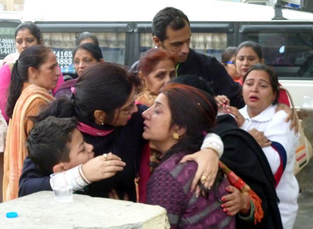 Family members of the mishap victims consoling each other on Friday . (Sanjeev Kumar/HT photo) Family members of the mishap victims consoling each other on Friday . (Sanjeev Kumar/HT photo)