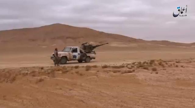 A still image taken on December 11, 2016 from a video released by Islamic State-affiliated Amaq news agency on December 10, 2016, purports to show Islamic State fighters advancing over the Hayan mountain south of Palmyra. (REUTERS) A still image taken on December 11, 2016 from a video released by Islamic State-affiliated Amaq news agency on December 10, 2016, purports to show Islamic State fighters advancing over the Hayan mountain south of Palmyra. (REUTERS)