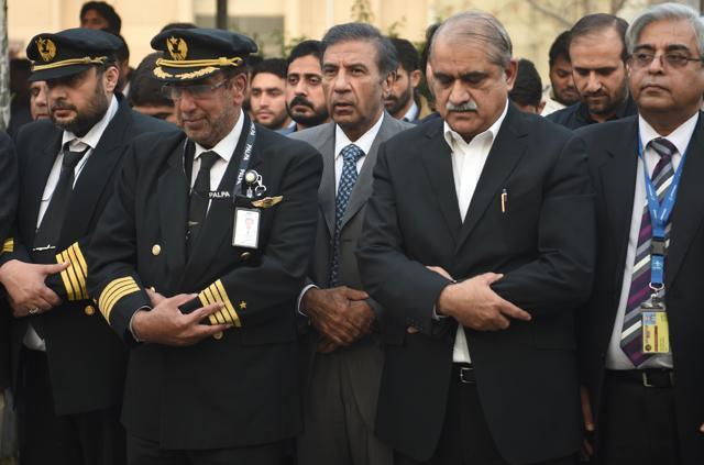 Chairman of Pakistan International Airlines Azam Saigol (C) along with officials offers funeral prayers for plane crash victims in Islamabad on December 8. (AFP file photo) Chairman of Pakistan International Airlines Azam Saigol (C) along with officials offers funeral prayers for plane crash victims in Islamabad on December 8. (AFP file photo)