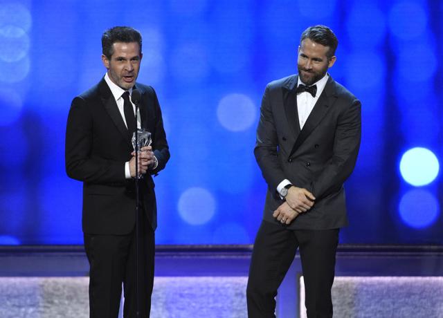 Simon Kinberg, left, and Ryan Reynolds accept the award for best comedy for Deadpool at the 22nd annual Critics' Choice Awards at the Barker Hangar. (Chris Pizzello/Invision/AP) Simon Kinberg, left, and Ryan Reynolds accept the award for best comedy for Deadpool at the 22nd annual Critics' Choice Awards at the Barker Hangar. (Chris Pizzello/Invision/AP)