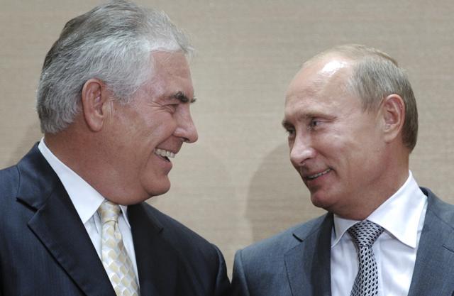 In this Aug. 30, 2011, file photo, Russian Prime Minister Vladimir Putin, right, and Rex Tillerson, ExxonMobil's chief executive smile during a signing ceremony in the Black Sea resort of Sochi, Russia. (AP) In this Aug. 30, 2011, file photo, Russian Prime Minister Vladimir Putin, right, and Rex Tillerson, ExxonMobil's chief executive smile during a signing ceremony in the Black Sea resort of Sochi, Russia. (AP)