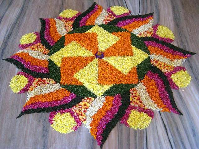 A flower rangoli can add that dash of colour to your celebrations. (dhruvplanet.com)