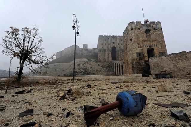 The remains of a shell are pictured outside Aleppo's historic citadel, during a media tour, Syria. (REUTERS)