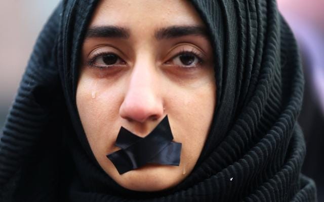 A Turkish student cries during a protest to show solidarity with trapped citizens of Aleppo, Syria, in Sarajevo, Bosnia and Herzegovina. (REUTERS)