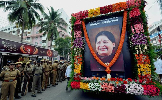 Security men guard during an AIADMK rally to pay tribute J Jayalalithaa in Coimbatore on Sunday. (PTI) Security men guard during an AIADMK rally to pay tribute J Jayalalithaa in Coimbatore on Sunday. (PTI)