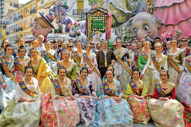 The women ambassadors of the Fallas are dressed in finery with elaborate hair styles The women ambassadors of the Fallas are dressed in finery with elaborate hair styles