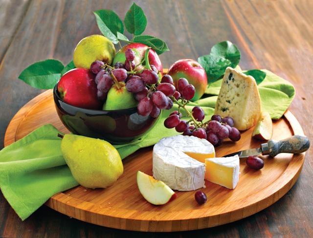 The combination of fresh fruits and less processed cheese helps curb sweet cravings (Shutterstock) The combination of fresh fruits and less processed cheese helps curb sweet cravings (Shutterstock)
