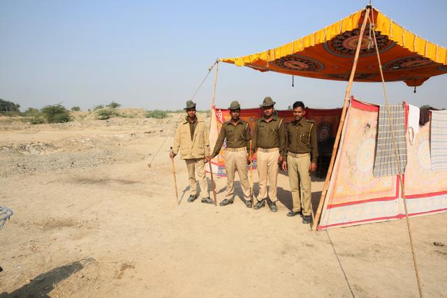 Men from the Rajasthan Armed Constabulary stand guard at the quarry. (Himanshu Vyas/HT ) Men from the Rajasthan Armed Constabulary stand guard at the quarry. (Himanshu Vyas/HT )