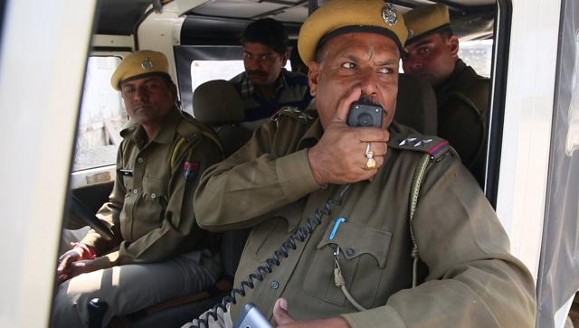 SHO Prem Singh NAthawat makes public announcement in villages around the site where reportedly gold coins were found. (Himanshu Vyas/HT ) SHO Prem Singh NAthawat makes public announcement in villages around the site where reportedly gold coins were found. (Himanshu Vyas/HT )