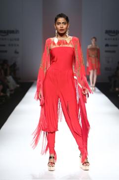 For a winter wedding, opt for a bright-coloured onesie like this one and layer it up to add some style. (Pria Kataria Puri )