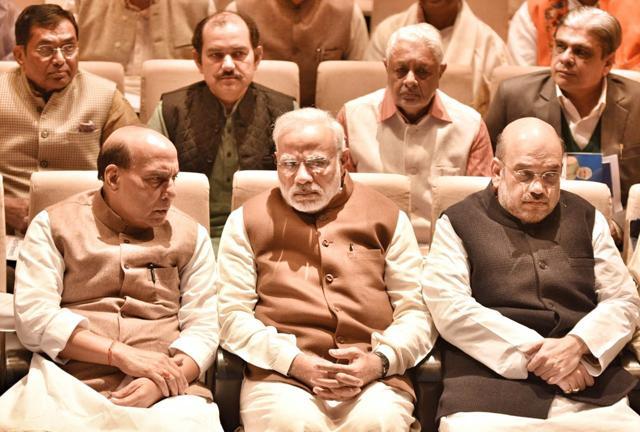 Prime Minister Narendra Modi with Rajnath Singh and Amit Shah at the BJP meet on Friday. (Arun Sharma/HT Photo) Prime Minister Narendra Modi with Rajnath Singh and Amit Shah at the BJP meet on Friday. (Arun Sharma/HT Photo)