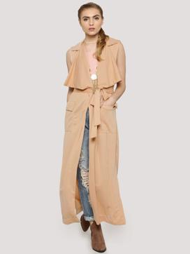Go casual chic with loose wraparounds over jeans and ankle-length boots as in this ensemble. (Koovs.in)