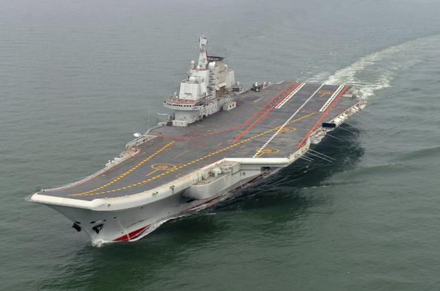 In this May 2012 file photo provided by China's Xinhua News Agency, Chinese aircraft carrier Liaoning cruises for a test in the sea. (AP)