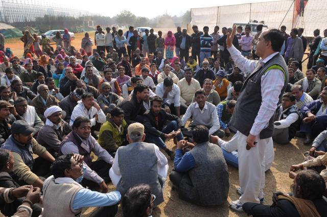 Sanitation workers staged a sit-in at the Sector 21A stadium. (Burhaan Kinu/HT PHOTO)