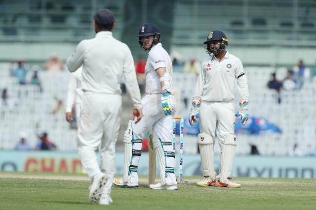 Liam Dawson of England looks back at India captain Virat Kohli after he was nearly hit by a throw during day two of the 5th Test between India and England at the MA Chidambaram Stadium, Chennai. (BCCI)